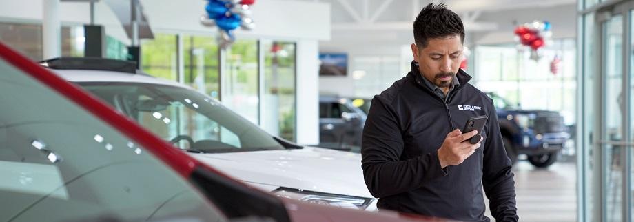 Salesperson looking at tablet