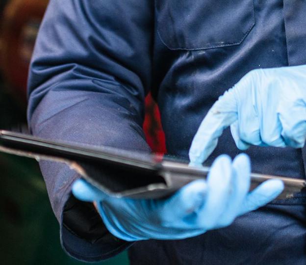 mechanic hands using tablet